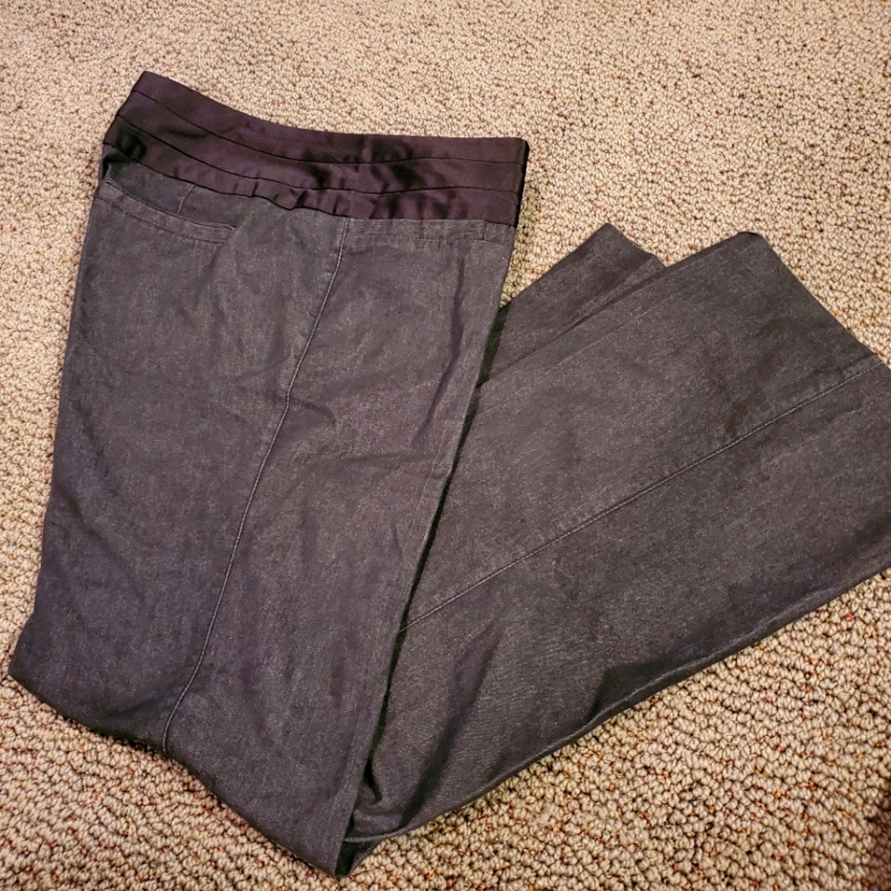 Black jeans with silk accent on top